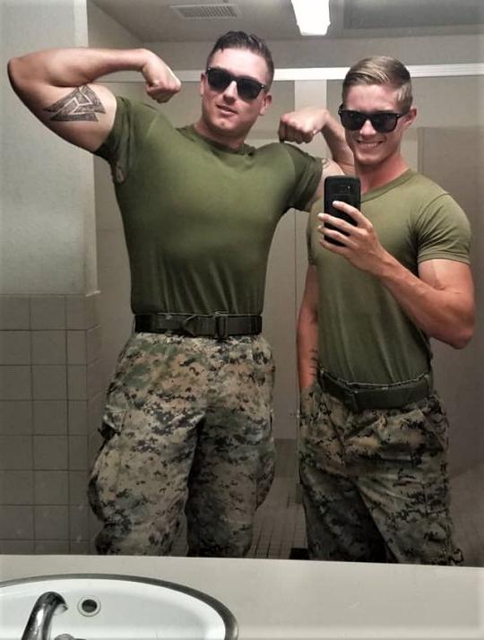 two-young-strong-muscle-biceps-military-uniform-soldiers-sunglasses