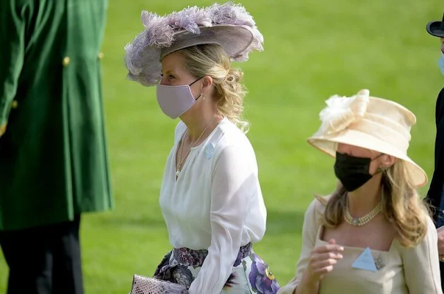 The Countess wore a floral skirt by Suzannah, and white blouse by ARossGirl x Soler. The Duchess wore a chiffon dress by Fiona Clare