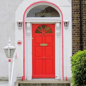 Orange Dublin door with matching trim in Sandymount