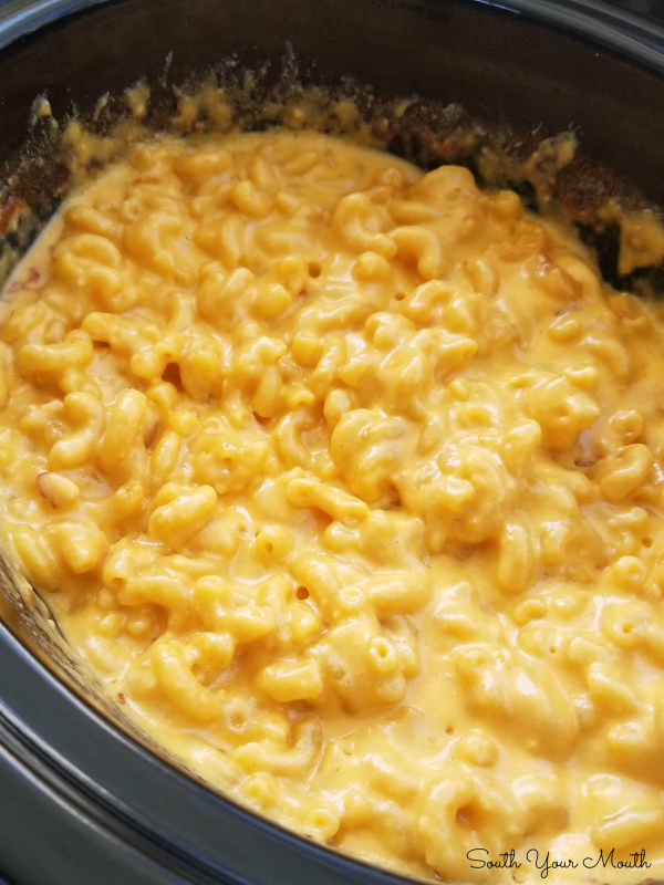 This is a photo of No-Boil Crock Pot Macaroni and cheese shown in the crock pot after cooking, ready to serve.