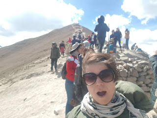 Me at the Rainbow Mountain with the second peak in the background Me at the Rainbow Mountain with the second peak in the background