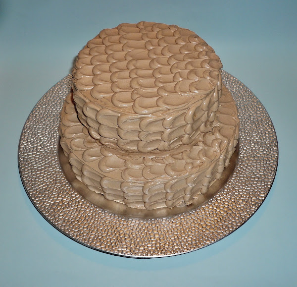 Tarta de chocolate, canela y crema de merengue suizo de nocilla