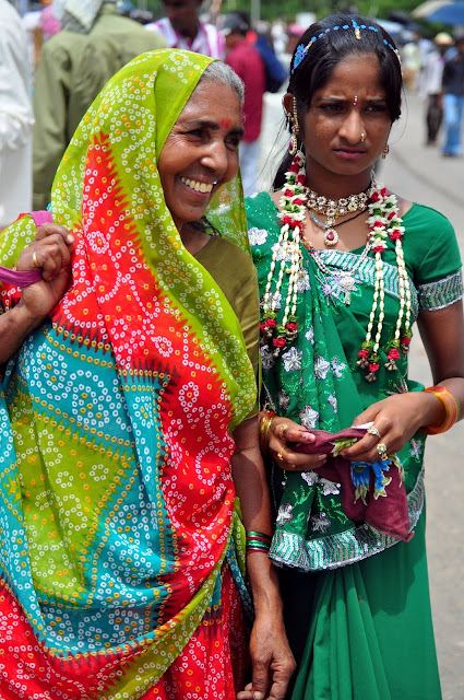 portrait indian tribal woman women girl tarnetar gujarat fair festival colourful face