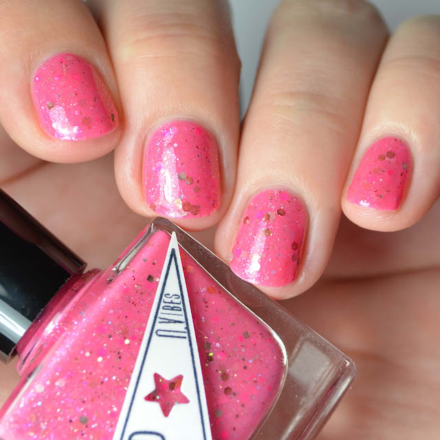 pink nail polish with glitter