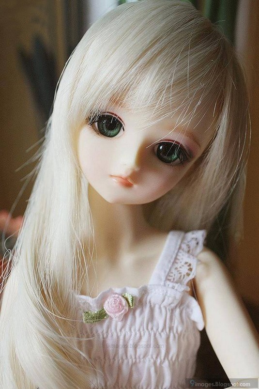 Doll cute girl innocent blonde