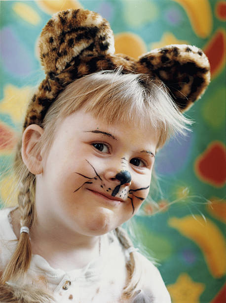 little girl with cat face painting