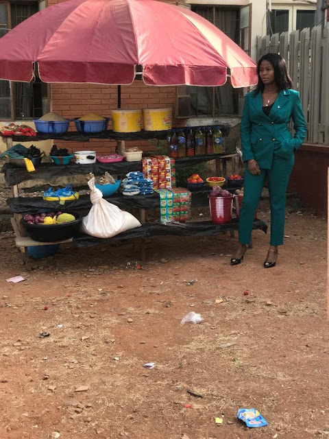 Nigerian Lady shows off her Corporate Outfit as she sells Foodstuffs in Abuja (Pictures)