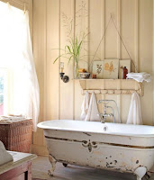 Unique bathroom decor for rustic farmhouse bathroom with hanging shelves rustic bath tub and vintage wall sconce