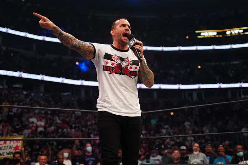 Booker T faz duras críticas a CM Punk ter “mencionado” a WWE em sua estreia na AEW