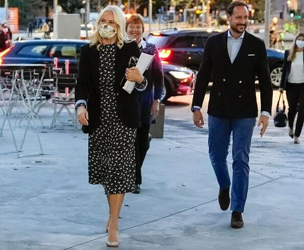 Crown Princess Mette-Marit wore a birds-flying print midi dress by Pia Tjelta. Crown Prince Haakon accompanied Crown Princess Mette-Marit