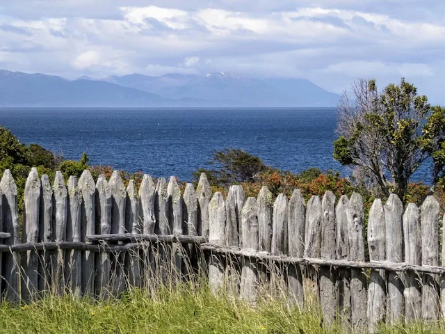 Patagonia Birding: Wooden fence and view of the Strait of Magellan at Fort Bulnes near Punta Arenas Chile