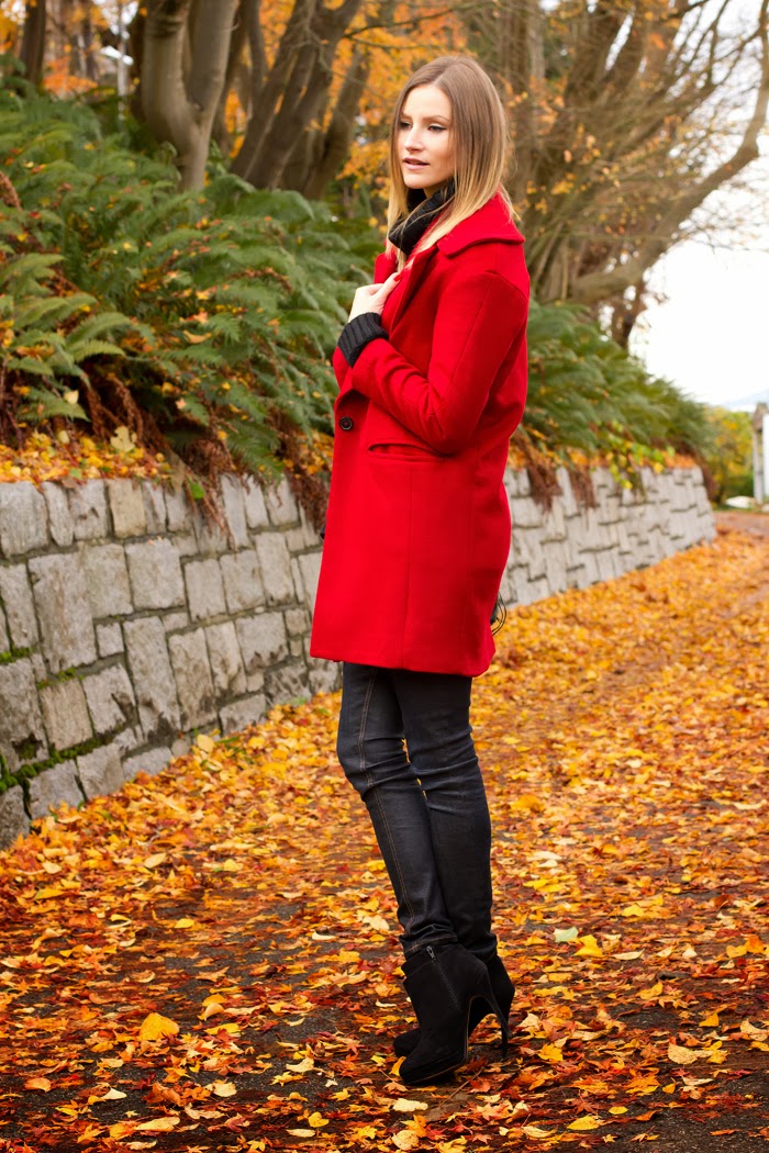 Vancouver Fashion Blogger, Alison Hutchinson, is wearing a red zara coat, black H&M turtleneck, dark blue Rag & Bone jeans, black high hell zara booties, and a recbecca minkoff loepard print bucket bag