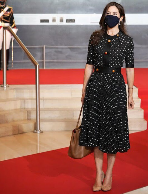 Crown Princess Mary wore a new polka dot pleated dress from Prada. French President Emmanuel Macron