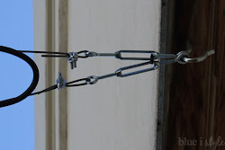 string lights hang patio outdoor lighting guide wire between wires hooks installation pergola attaching screw using ceiling commercial hung end