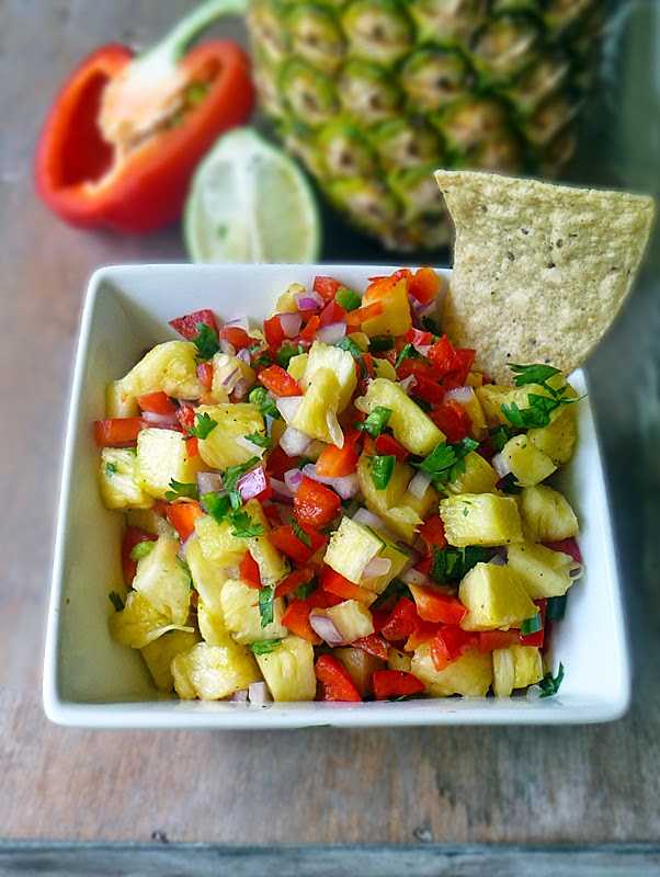Sweet and Spicy Pineapple Salsa | by Life Tastes good goes great with some salty tortilla chips and a comfy couch <wink>, but topping fish, chicken, or even pork with a sweet and spicy fruit salsa is an easy way to turn a plain dinner into a fabulous gourmet meal! #Appetizer #Mexican
