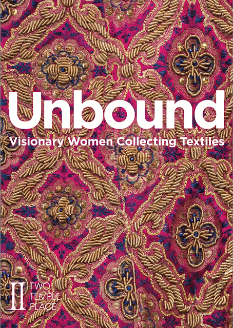 Bright pink fabric with gold embroidery with the text Unbound Visionary Women Collecting Textiles in the centre of image