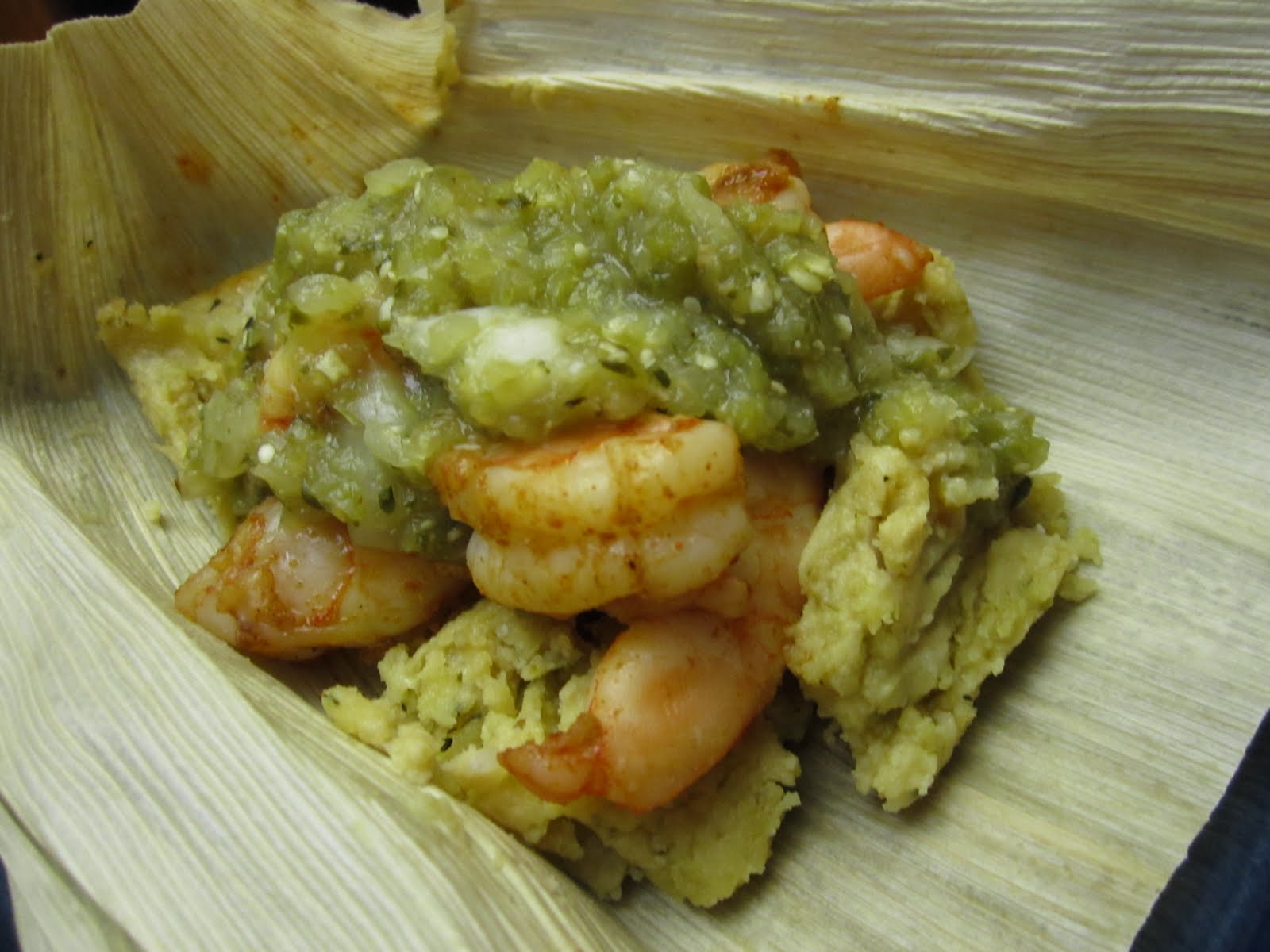 sliced pineapple homemade spicy shrimp tamales with roasted tomatillo
