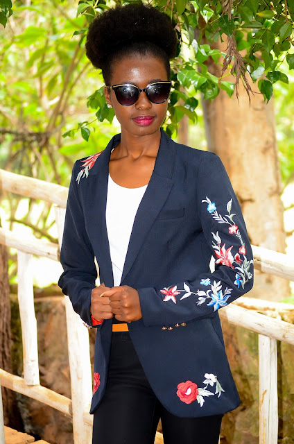 Wearing An Embroidered Women's Blazer With Patent Leather Boots