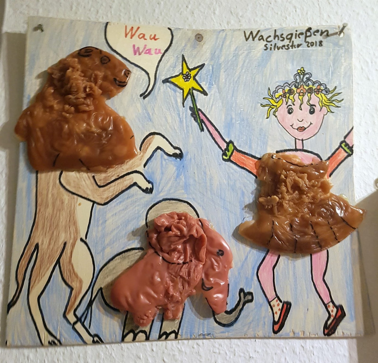 Zange und Hammer Bild aus den Figuren vom Wachsgießen an Silvester