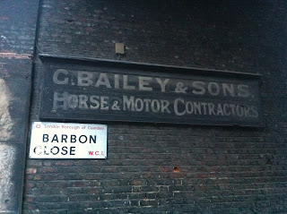 Old sign in Barbon Close, London WC1