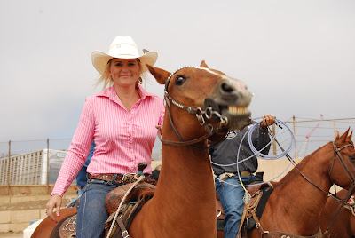 cowgirl in pink shirt