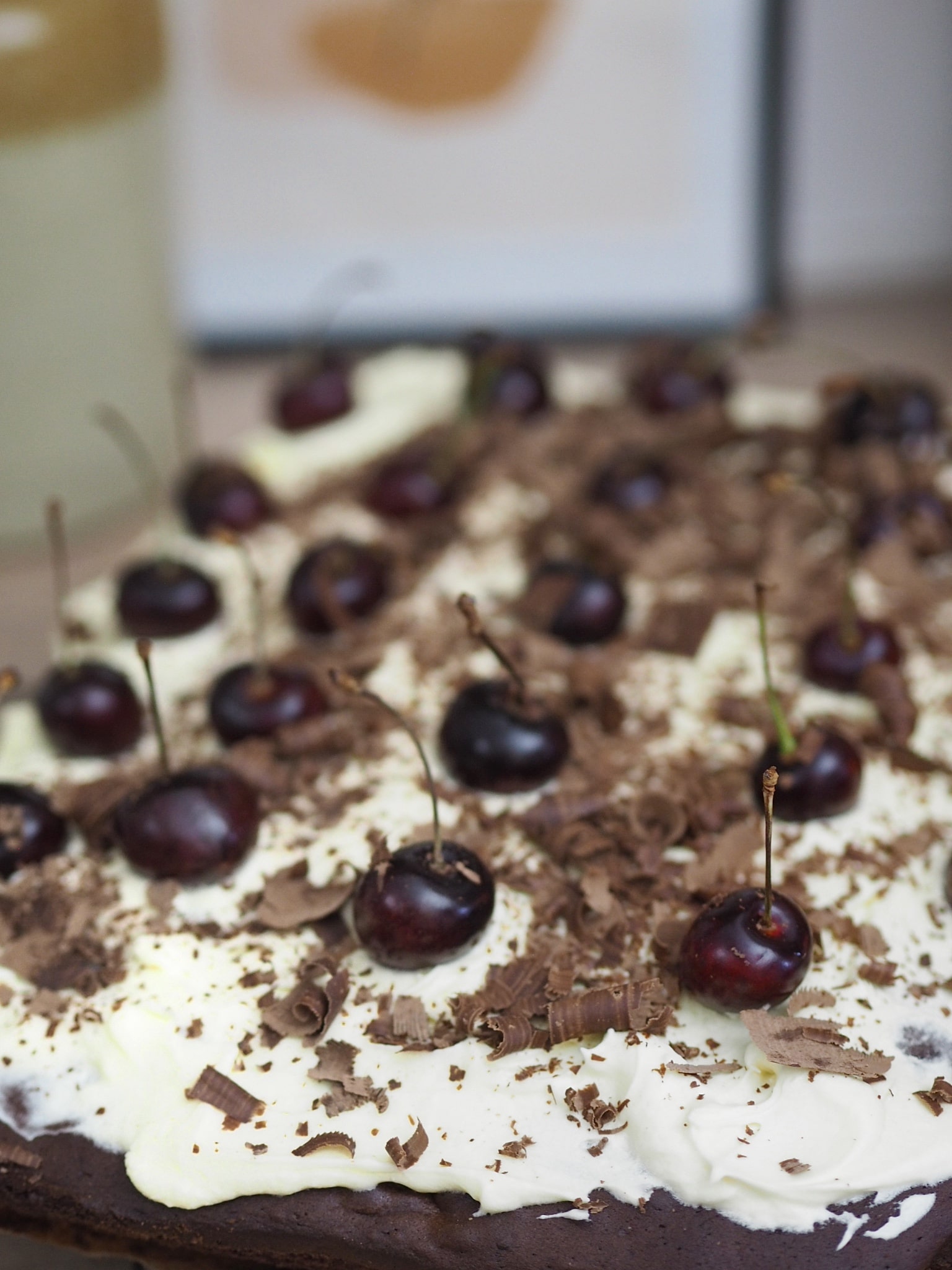 Simple recipe for baking a black forest cherry tray bake sponge. Easy recipe for beginners, perfect for winter and Christmas party desserts
