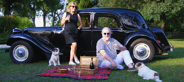 Enjoying a champagne aperitif with a classic Citroen Traction Avant, France. Photo by Loire Valley Time Travel.