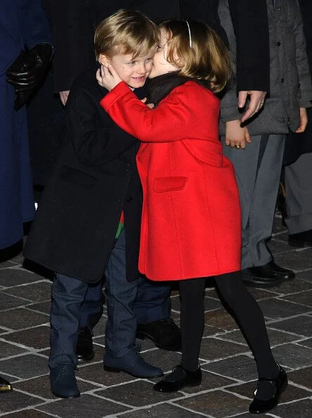 Prince Albert, Princess Charlene, Princess Gabriella and Prince Jacques attended Saint Devota event. royal blue cahmere wool coat