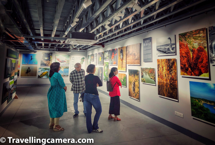 A visit to Museo Camera, a museum dedicated to the history of cameras and photography, was long pending. Ever since it opened in the beginning of this year, VJ and I had talked often about it. Museo Camera, India's first not-for-profit, crowd-funded Center for Photographic Art, is an inspiring story in itself. Aditya Arya's years of hard work, dedication, and passion to the field of photography have culminated in the creation of this magical space.   The museum, earlier located in the basement of Aditya Arya's home, has now shifted to this beautiful building that is a fine specimen of strong, industrial architecture. Built around a mesh of sturdy, exposed iron beams, the museum is a sight to behold. And we have not even started talking about the content yet.   Located in one of the prime addresses of Gurgaon, DLF Phase 4, Museo Camera houses over 1500 cameras and 100s of other photography equipment such as apertures, light meters, artificial lighting equipment from various eras and was created through citizen funding. One of the most remarkable galleries in the museum is the one that covers the history of photography spanning across more than 200 years and a history of cameras.   The gallery starts with a prototype of Camera Obscura. The word Camera Obscura is latin and literally means the dark room. Mr Arya told us the that the word Camera was earlier spelled with a "K". So it was "Kamera". The urdu word "kamra" probably has the same origin. Languages are really interesting, aren't they?   Anyhow, the original Camera Obscura used to be as large as a room. The one in the Museum is a small box just to demonstrate how the original equipment used to work. Basically the basis is a natural optical phenomenon known as the pinhole image. When a scene outside a tent or a wall is projected on the otherside through a small opening, it appears reversed. This kind of a projection was earlier used for creating sketches and to study solar eclipse without damaging the eyes.   Then you come across the founding fathers of photography - Nicéphore Niépce, Louis-Jacques Mandé Daguerre, Sir John Hershel, and Louis Daguerre. You start with how Niepce created the first photograph and then learn about Dagerreotype, the photography technique created by Louis-Jacques Mande Daguerre. You find out how photography was so named, and then how the art of creating negatives was developed to ensure that photographs could be reproduced.   You walk along a huge wall that talks about the history of photography and the major contributors. Not only do you learn about the dates and pioneering companies such as Kodak, you also see several original photographs clicked by some very old cameras. You find out about photographers who have made significant contributions to the world of photography.   If you look closely, you will also find treasures such as original old advertisements and how they have evolved. You come across cameras of various shapes and sizes. You also see a hint of how studios were set up earlier. Another interesting fact that Mr Arya shared with us was about the portraits that were clicked during Victorian times. Mr. Arya has sourced them from auctions, flea markets, etc over the years.   If you have seen some of these portraits you would notice the lack of smiles and a passive expression in the subjects. The reason for that was that at those times, since aperture was very small, the exposure needed to be larger and as a result slightest of movements would blur the images. Therefore subjects were asked to strike a natural pose that would be easy to hold for 15 seconds or so.   The ground floor houses this interesting gallery and a shop from where you can buy mementos. There's also a cafe, called "fig at museo" that serves some delicious looking food, which we were unfortunately not able to sample today. But it looks like a cool and relaxed space.   The first floor houses exhibition halls where currently the Aravalli series is on display. Photographers can rent the space for their exhibitions here. It is a fairly large space and the infrastructure too is good. The place also gets good footfall from the right kind of audience.   The second floor has a classroom/conference hall where one can organize workshops or talks or other events. Apparently, there are four such spaces in the building. There's also a small library here where you can sit and read. You cannot rent out the books yet. That is still being figured out. In this space, amateur photographers can also put their work up for display and even sell it to walk-in customers.   Apart from this all, there's an amazing sign here that says "Photography is strictly allowed". It is such a warm and friendly place. Coming to the ticketing aspect of it, you need to pay Rs 200 per person, unless you are a founding member. We became founding members during the initial rounds of crowd sourcing. You can still become one. The information is available at the front desk.   Mr Aditya Arya has always been an inspiring person for us. We have followed his journey as a photographer very closely. Apart from that, we also visited his farm in the Aravallis where he has built a stone cottage all by himself. He was also at the helm of the Aravalli exhibition that was an attempt to put forth the plight of the Aravalli Ecosystem. And now Museo Camera. Mr Arya says that he is always working on something in parallel that may convert into something substantial in the long run. I think that is what sets him apart. And that is what makes him a visionary.    MUSEO CAMERA Shri Ganesh Mandir Marg, DLF Phase IV, Sector 28, Gurugram, Haryana 122002 Gurgaon, Haryana 122001 M: +91 8287814216
