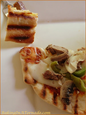 Grilled Steak and Pepper Pizza: thin crispy crust with a hint of smoky flavor, topped with fresh ingredients and dressed with toppings of your choice | Recipe developed by www.BakingInATornado.com | #recipe #grilling #dinner #pizza