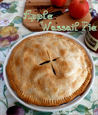 Add another layer of flavors to a holiday favorite, Apple Wassail Pie adds the flavors of the hot drink to your apple pie. | Recipe developed by www.BakingInATornado.com | #recipe #dessert
