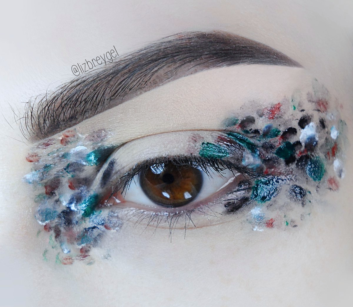 close up of creative, editorial makeup look by Liz Breygel makeup blogger.