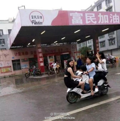 Five ladies spotted riding one tiny bike in China