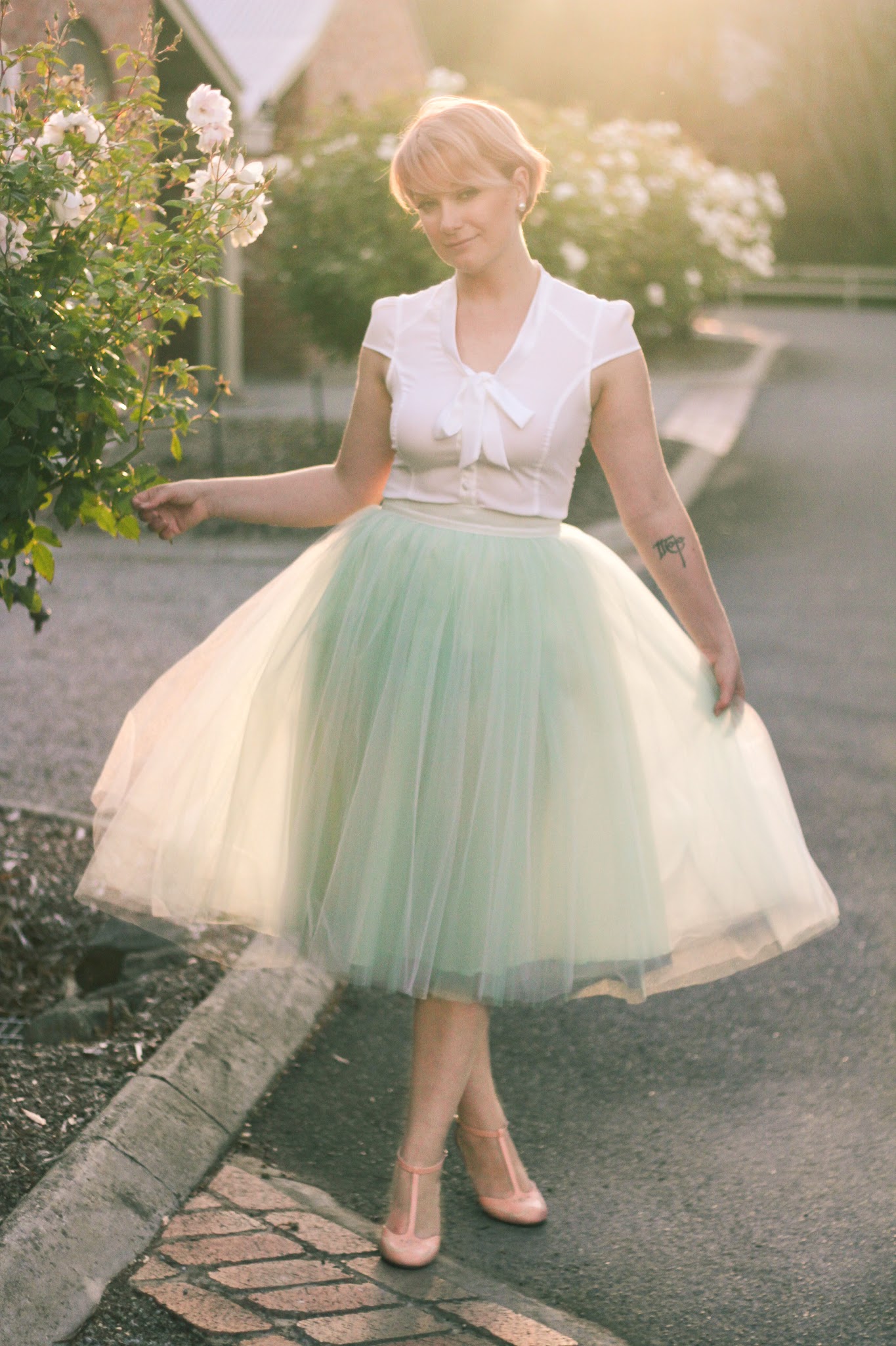 Finding Femme with rose gold hair in romantic mint Alexandra Grecco tulle skirt, Review Australia blouse and Modcloth shoes.
