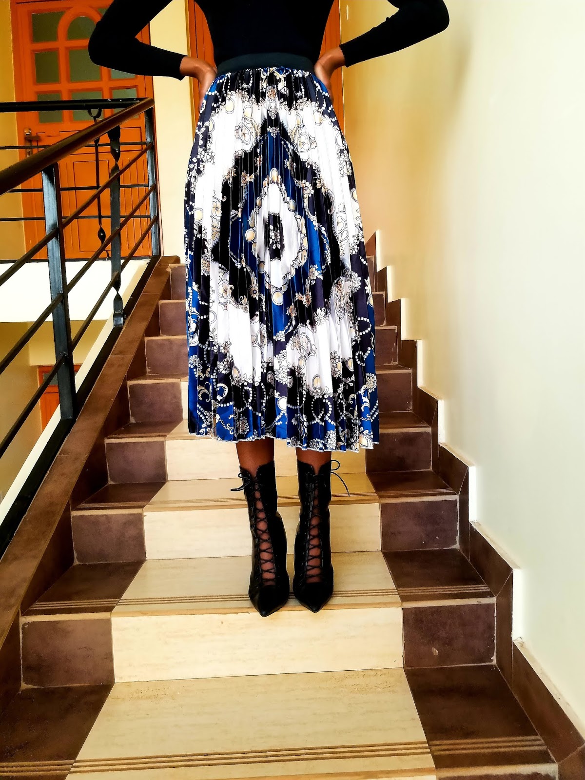 Here's How To Wear A Pleated Skirt In 2019