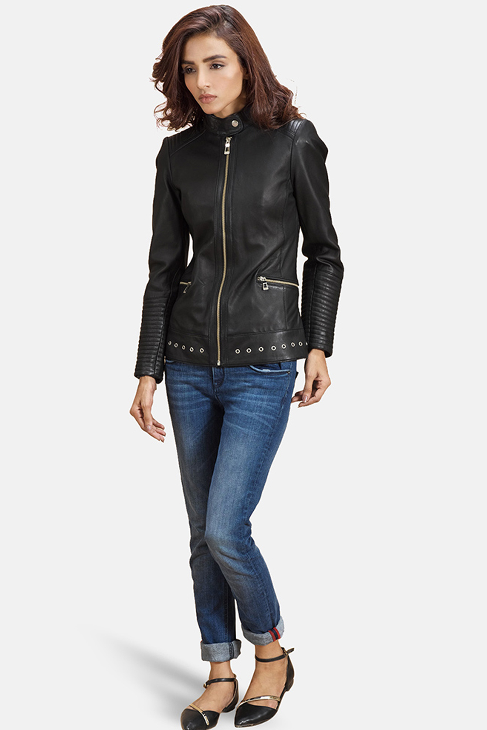 a lookbook snapshot of a woman wearing leather jacket