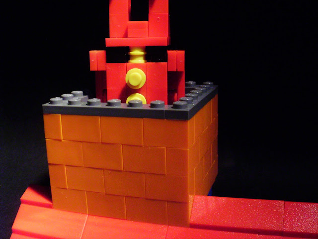 MOC LEGO Pai Natal desce pela chaminé