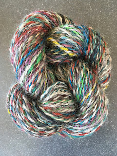 Multi-color skein of handspun rug yarn