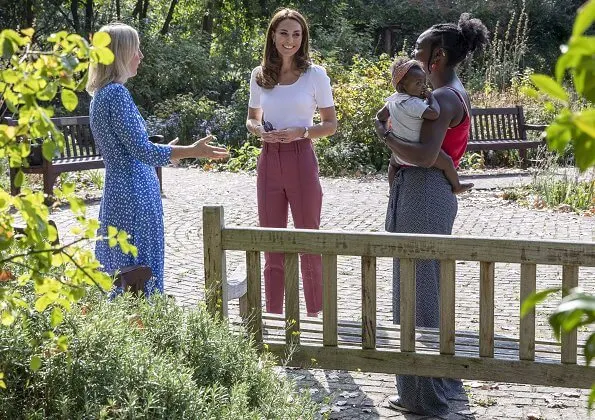 Kate Middleton wore a new short sleeve jumper from Ralph Lauren, wool slim leg trousers from Marks and Spencer, and Superga Cotu sneakers