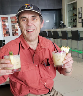 Two Pina Coladas, one for each hand