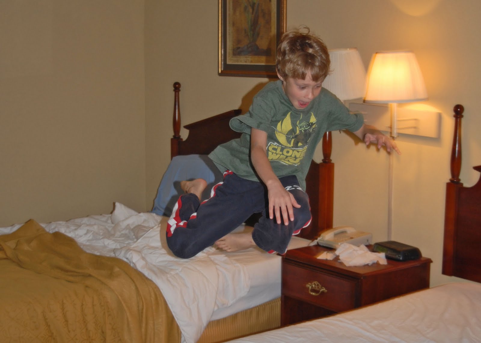 Waiting in the shade sitting on a brick Hotel bed jumping in Alabama