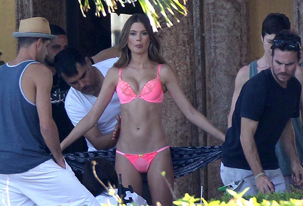 Adam Levine's model Behati Prinsloo gives her assets a squeeze