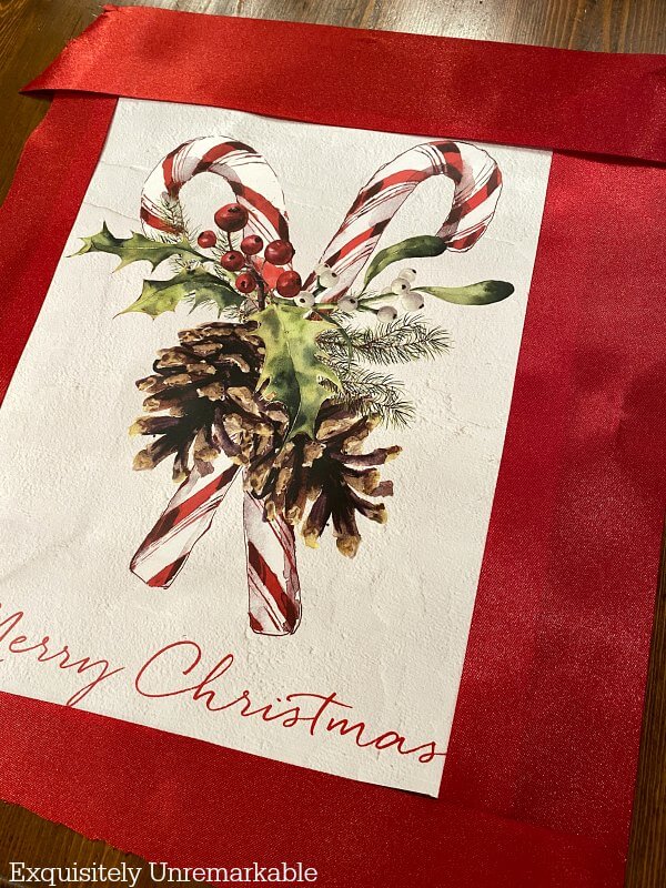 Merry Christmas Candy Cane Gift bag framed with red ribbon