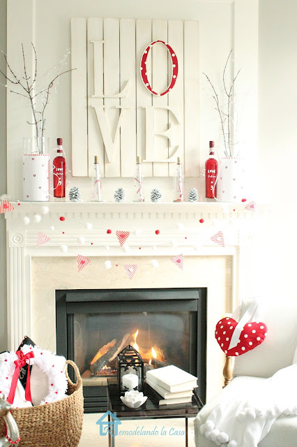 red Love potion No.9 bottles on white and red mantel