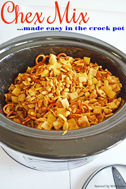 This Crock Pot Chex Mix is super easy to make and you won't be able to stop eating it. Parties and tailgates will never be the same. 