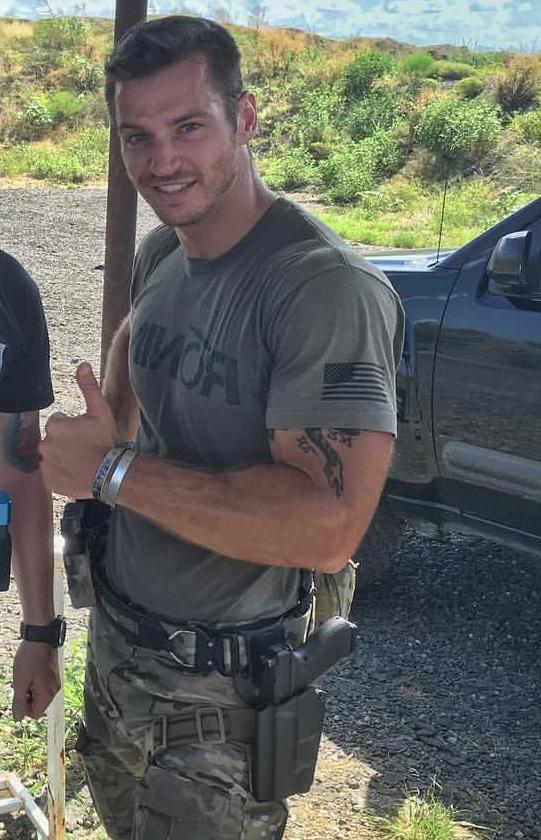 sexy-masculine-young-uniformed-male-soldier-showing-biceps