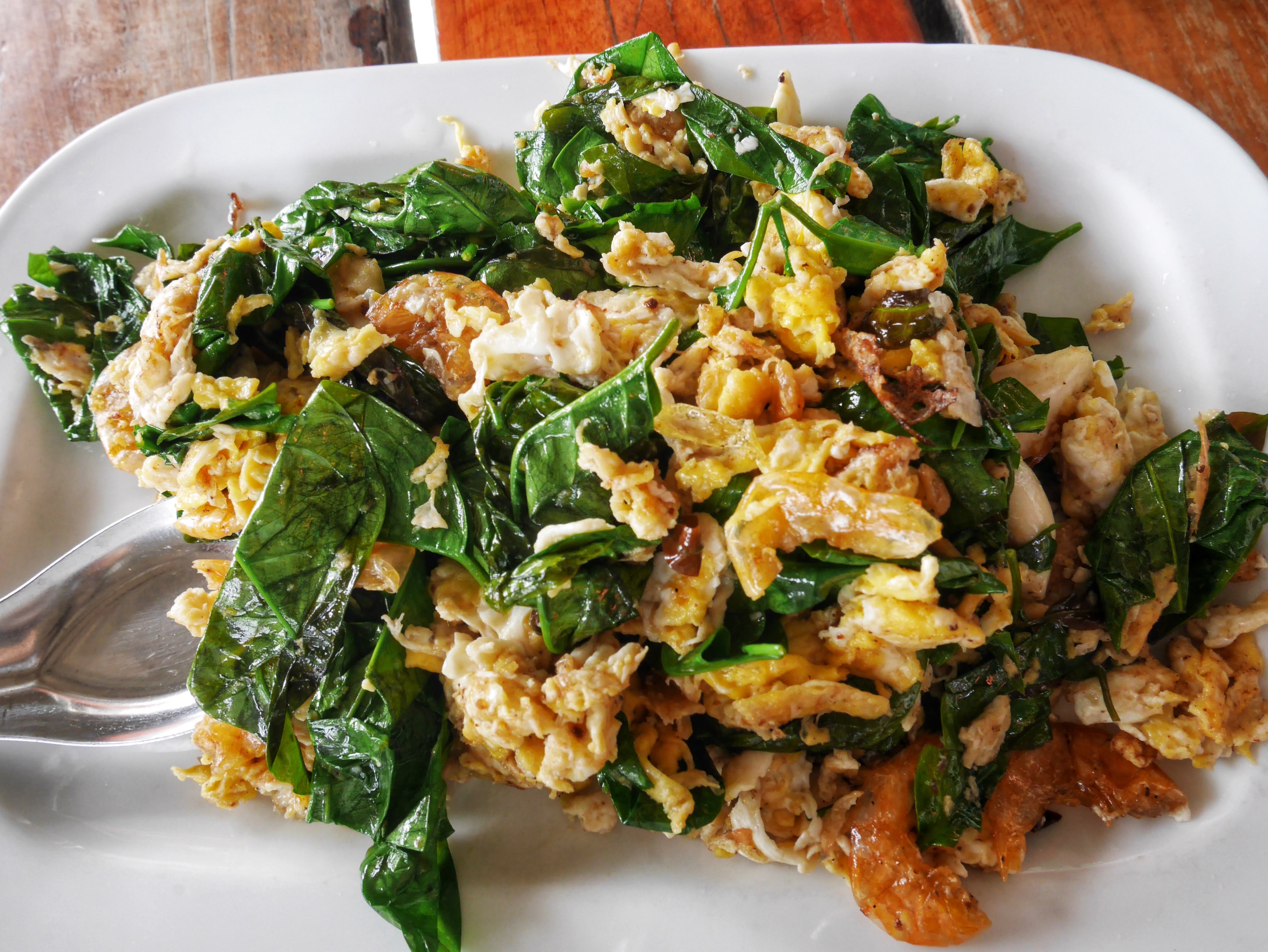 Bai Lieng Pad Kai, or Stir-fried Melinjo leaves with Egg in Hat Yai, Thailand