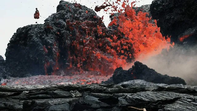 Lava erupts from a Kilauea volcano fissure in Leilani Estates, on Hawaii's Big Island, on May 24, 2018, in Pahoa.