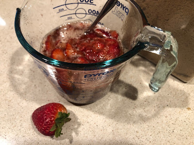 Strawberries in measuring cup