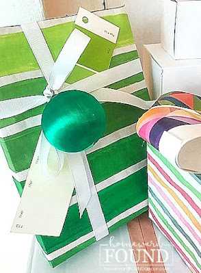 art,art class,paper crafts,Christmas,Christmas Decor Themes,holiday,color,colorful home,color palettes,DIY,diy decorating,gift wrapping,re-purposing,colorful gift wrapping,paint chips,paint chip crafts,upcycled paint chips,rainbow color palette,Christmas gift wrapping,gift wrap inspiration, bows.